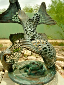 This statue by Tucson artist Joseph Lupiani depicts a horn lizard within a Sonora suckerfish. 