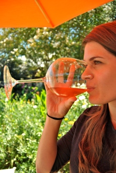 Allie Goldstein enjoys a glass at Saintsbury winery and vineyard.